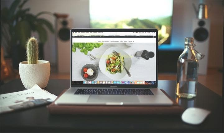 A laptop showing information about web design and web creation